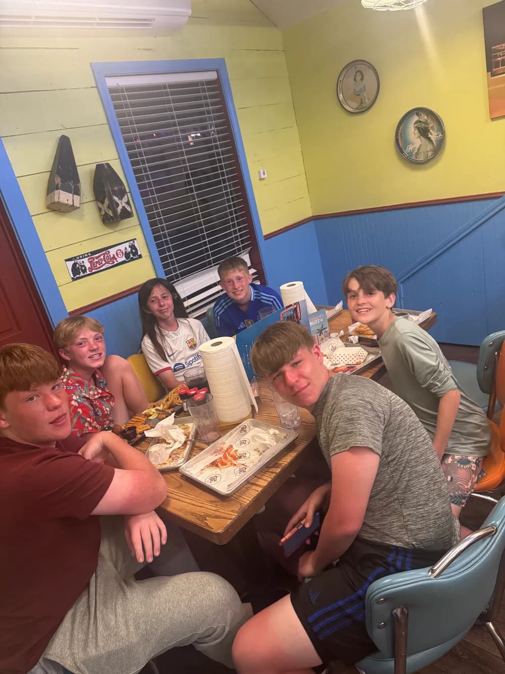 Players sharing a team dinner during the Galveston trip